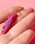 Bold Blossom Shop Pink Fancy Fish Bag Charm - model shown holding product