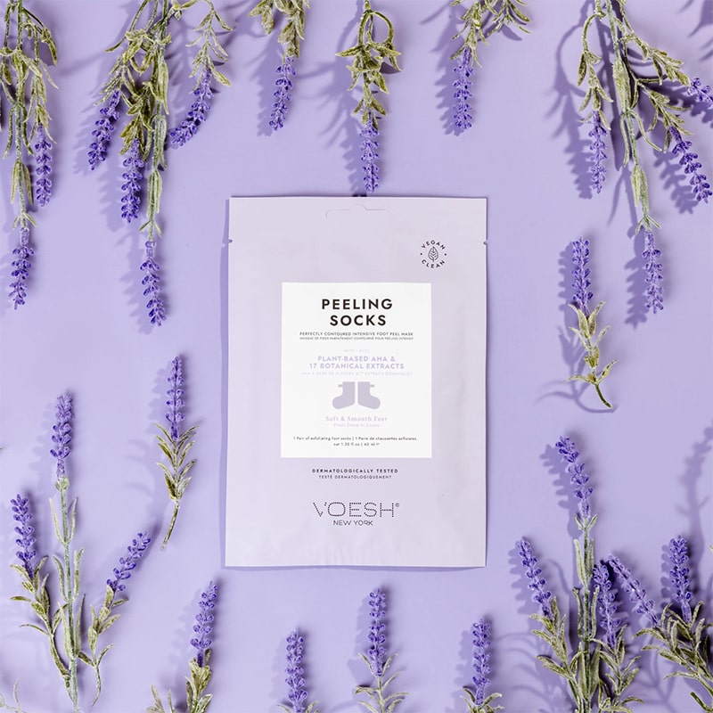 VOESH New York Peeling Socks - product packaging shown next to lavender flowers