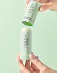 VOESH New York Solemate Heel Repair Balm - model shown taking product cap off