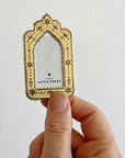 The Little Press Faux Tin Mini Arch Frame - Gold - model shown holding product