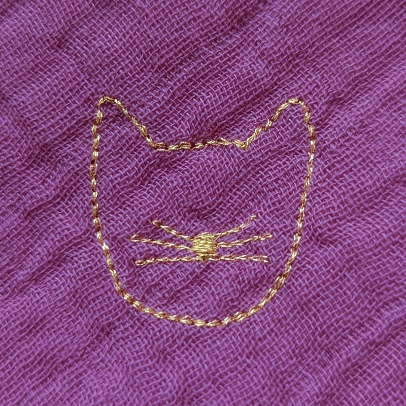 Close up of Barnabe Aime Le Cafe Double Gauze Cotton Embroidered Swaddle Lilac Purple - Cat (1 pc) (cat detail)