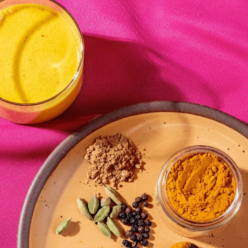 Diaspora Co Haldi Doodh Masala - product ingredients shown on table