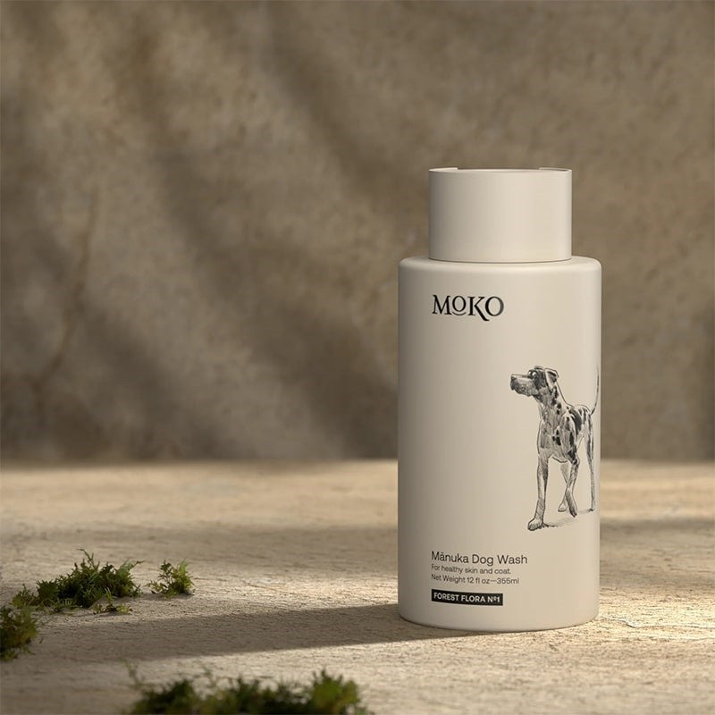 Moko Manuka Dog Wash - product shown on stone with moss