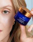 Augustinus Bader The Rich Eye Cream - model shown holding product