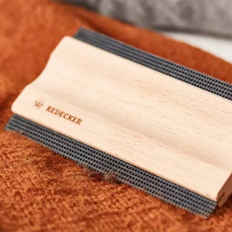 Burstenhaus Redecker Lint Comb - product shown on fabric