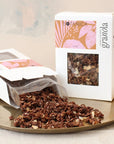 Botanica Foods Cacao Coconut Granola - two products shown one open with contents spilling out