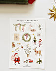 Emily Lex Studio Santa's Workshop Sticker Sheets - products shown next to napkins and star