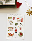 Emily Lex Studio Santa's Workshop Sticker Sheets - product shown next to star and books