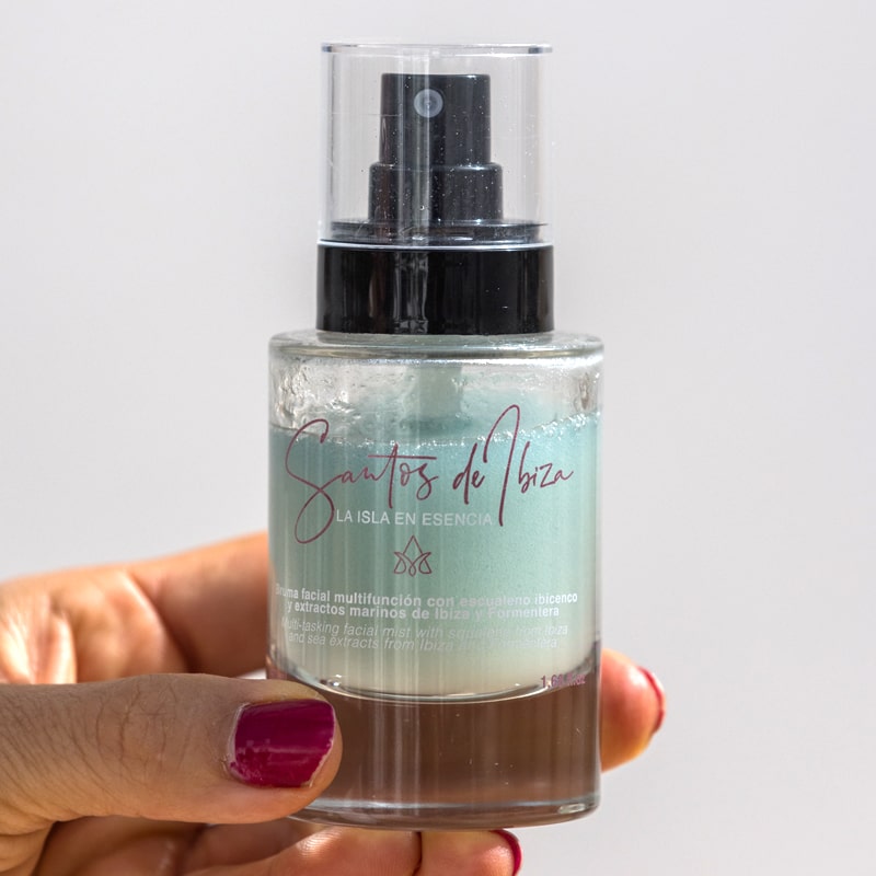 Close up of model holding Santos de Ibiza Facial Mist (50 ml)