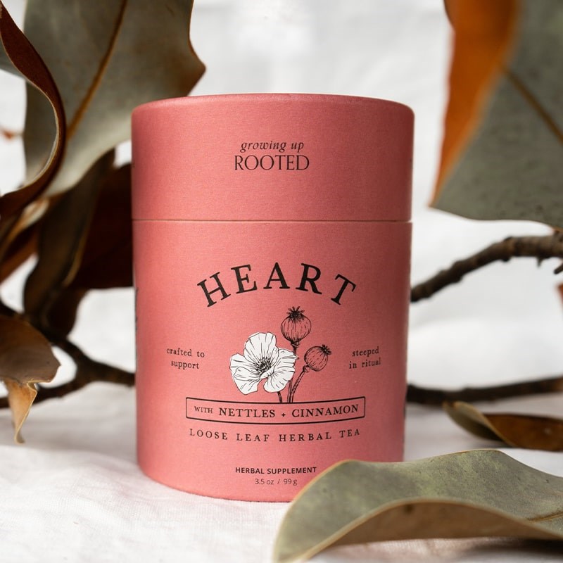 Growing Up Rooted Heart Loose Leaf Herbal Tea - product packaging by leaves