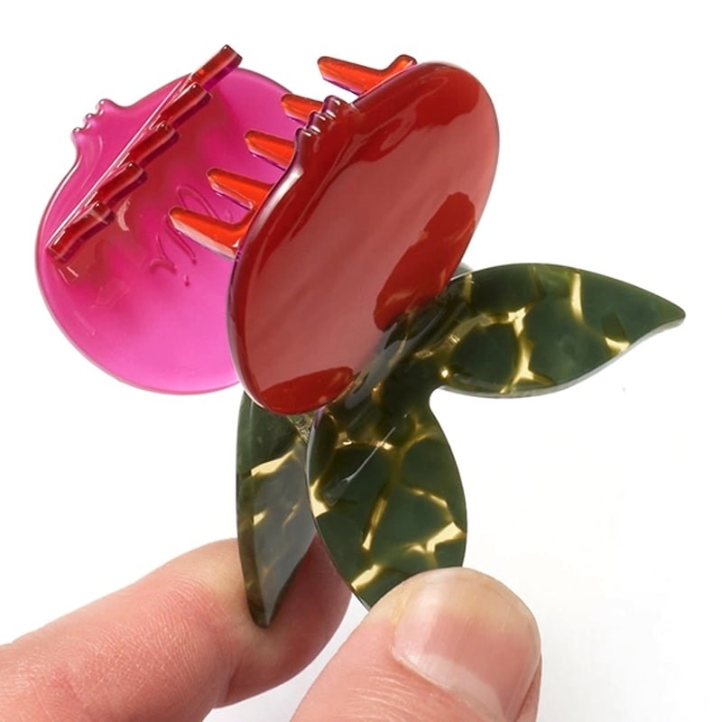 Close up of model holding Winona Irene Red Pomegranate Claw (1 pc)