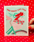 Lifestyle shot of Bromstad Printing Co. You Make Life Fun Dog Risograph Greeting Card (1 pc)