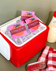 Mel Andrel Tomato-Do List Sticky Notes - products shown in ice chest next to picnic items