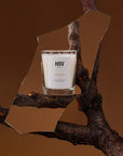 HoV Paris Scented Candle - Kodo (190 g) - product shown in mirror sitting on branch