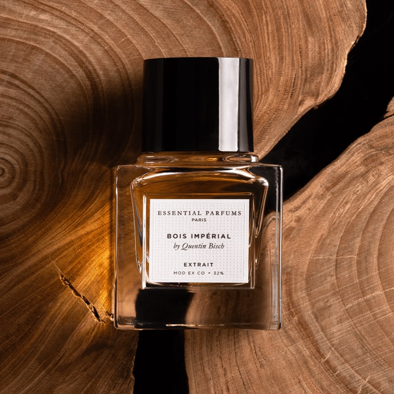 Essential Parfums Bois Imperial Extrait de Parfum by Quentin Bisch - product shown on top of wood