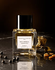 Essential Parfums Bois Imperial Extrait de Parfum by Quentin Bisch - product shown next to fragrance ingredients