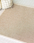 Sasawashi Bath Mat - Beige (medium) - product shown on bathroom floor