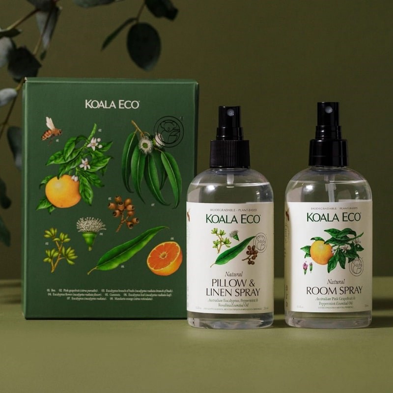 Koala Eco Aromatherapy Room & Linen Gift Collection - products shown next to product packaging and plants