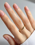 Kure Bazaar Colored Nail Hardener - Pink - models hand shown with product on nails