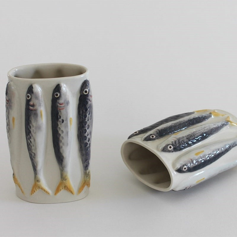 PetitFelts Porcelain Sardine Vase - two products shown upright and on its side shown