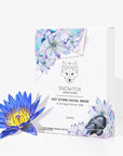 Snow Fox Skincare Hot Stone Facial Mask - product shown with flower