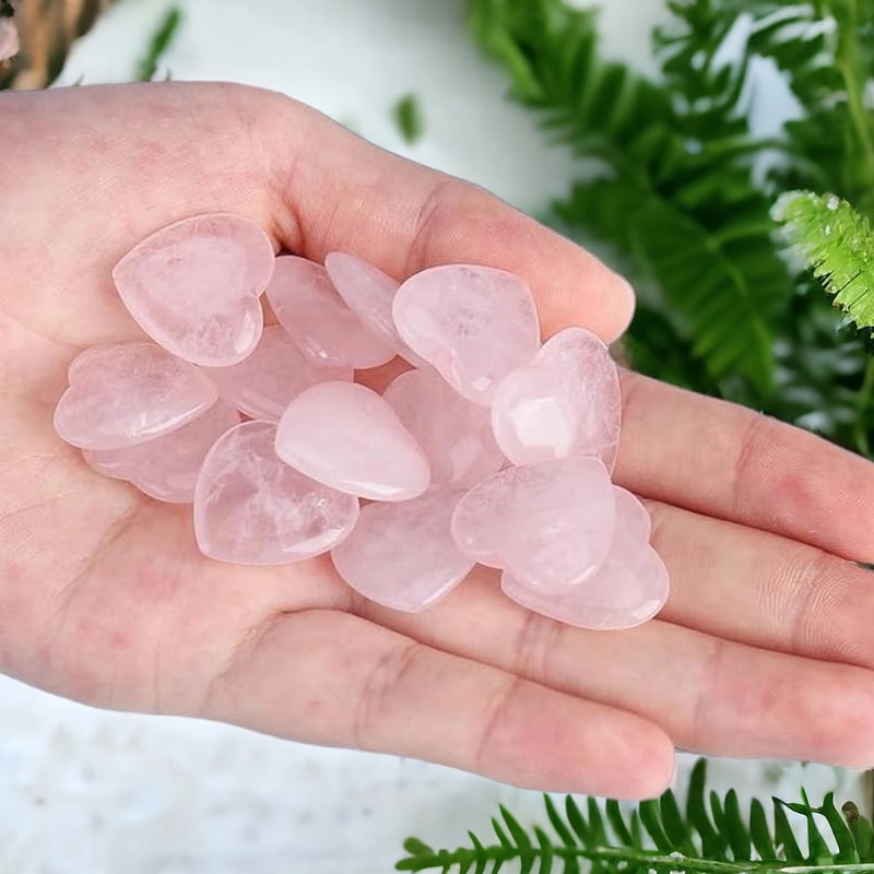 Wax Apothecary Rose Quartz Crystal Mini Heart - model shown holding multiple products in hand next to plants