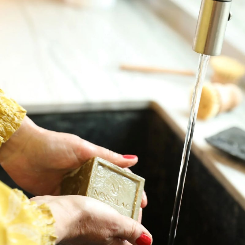 Nossilac Authentic Marseille Soap Cube - model shown using product in sink