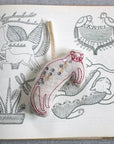 Skippy Cotton Baby Hugo Cat - Lavender Scented Token - product shown on top of illustrations 