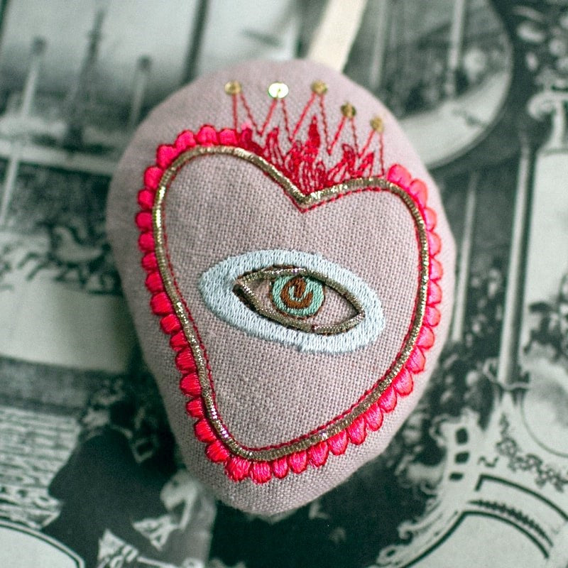 Skippy Cotton Sacred Heart - Lavender Scented Token - close up of product shown on top of illustration