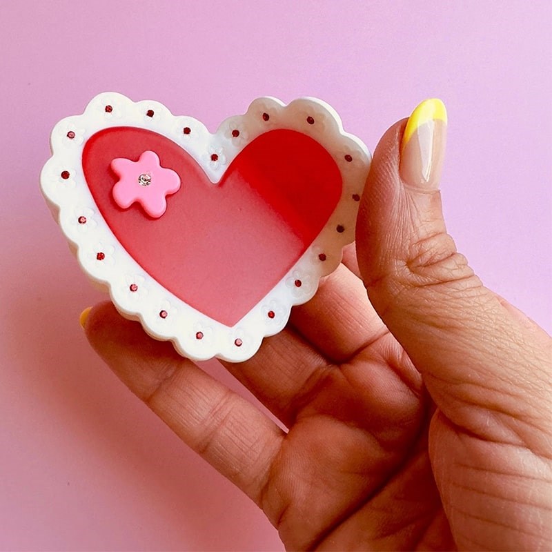 Centinelle Valentines Laced Hearts Hair Claw - model shown holding product