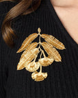 Botanopia Embroidered Brooch - Eucalyptus Flowers - model shown wearing product