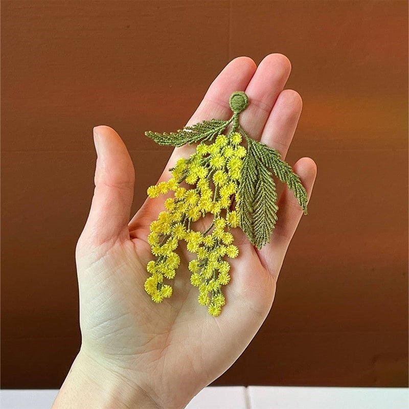 Botanopia Embroidered Brooch - Mimosa Flowers - model shown holding product