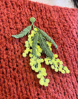 Botanopia Embroidered Brooch - Mimosa Flowers - model shown wearing product