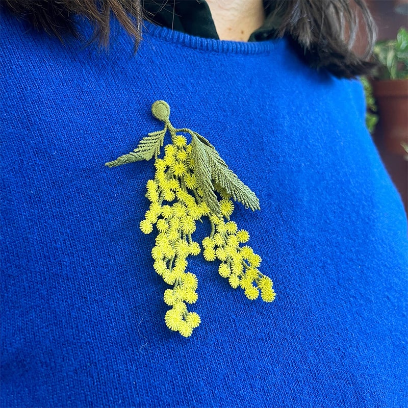 Botanopia Embroidered Brooch - Mimosa Flowers - model shown wearing product