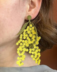 Botanopia Embroidered Brooch - Mimosa Flowers - model shown wearing product as earring