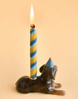 Camp Hollow Dachshund Cake Topper - backside of product shown with lit candle in it