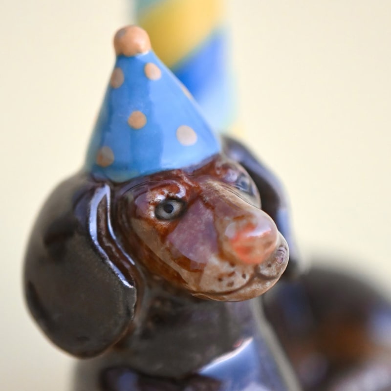 Camp Hollow Dachshund Cake Topper - close up of product detail