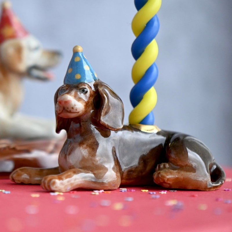 Camp Hollow Dachshund Cake Topper - product shown with candle in it