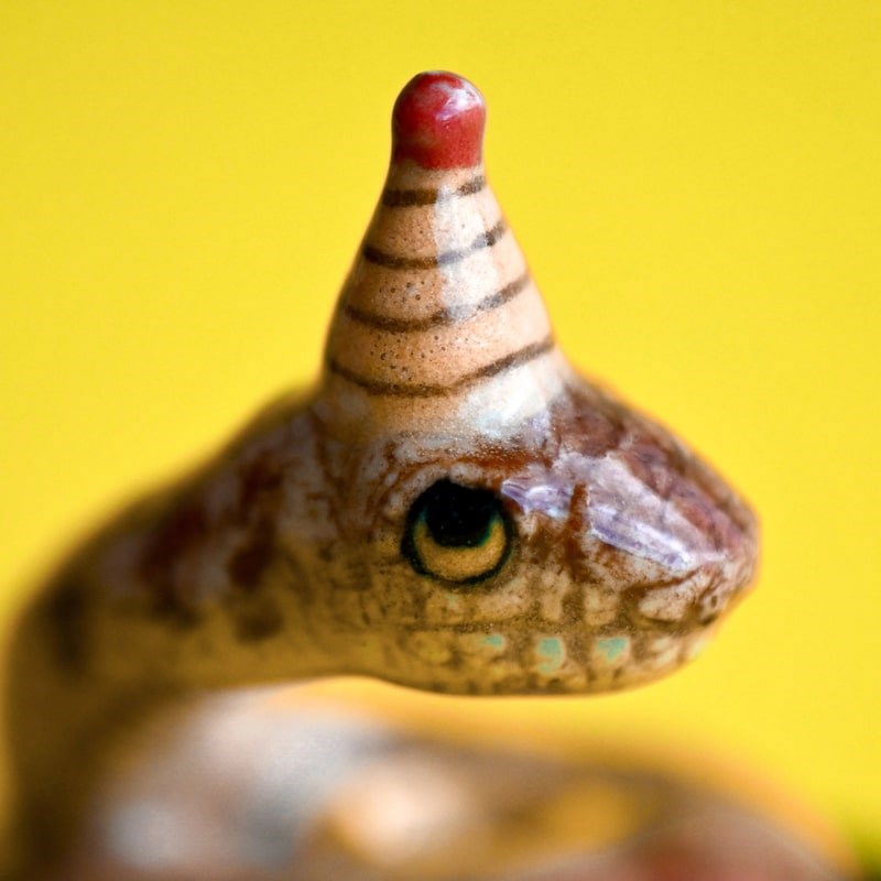 Camp Hollow Year of the Snake Cake Topper - close up of product details