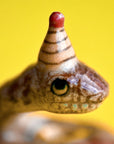 Camp Hollow Year of the Snake Cake Topper - close up of product details