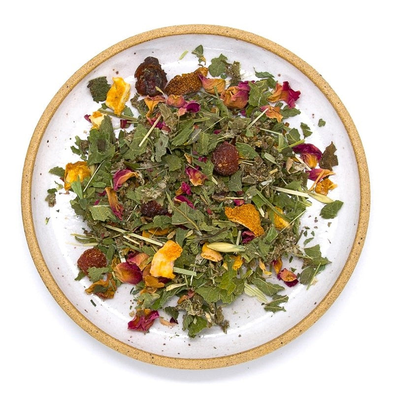 Wild & Tea Daily Nourish Herbal Tea - product shown on plate