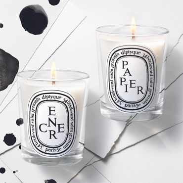 Diptyque - Set your creativity alight with two Limited Edition Candles: Papier, an ode to paper, and Encre inspired by ink.