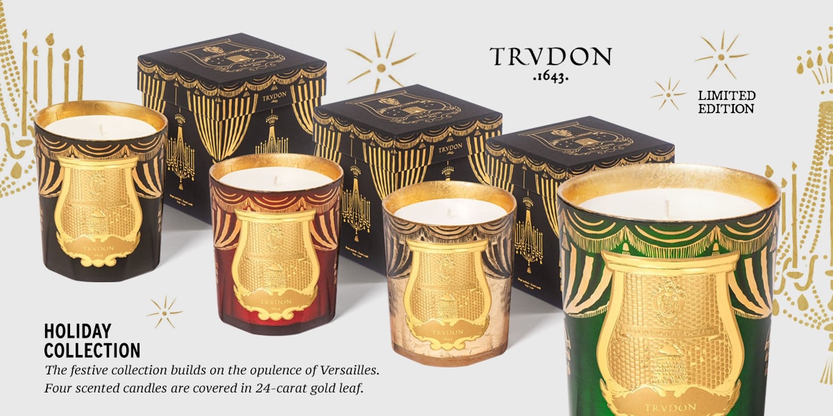 Trudon Limited Edition Holiday Collection. The festive collection builds on the opulence of Versailles. Four scented candles are covered in 24-carat gold leaf.