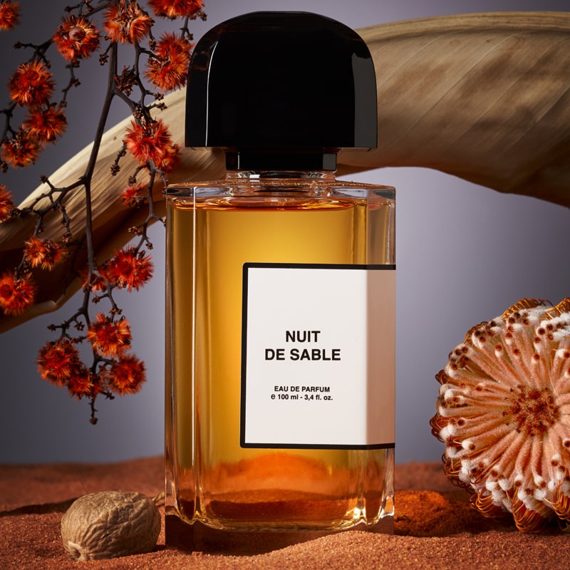 BDK Parfums Nuit de Sable Eau de Parfum (100 ml) beauty shot with plants (not included)
