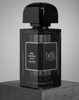 BDK Parfums Gris Charnel Extrait (100 ml) showing bottle sitting on stone
